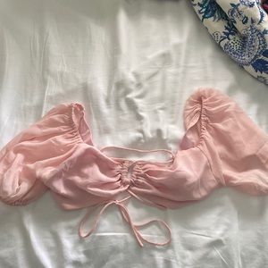 Beginning Boutique top. Light pink lace up back.